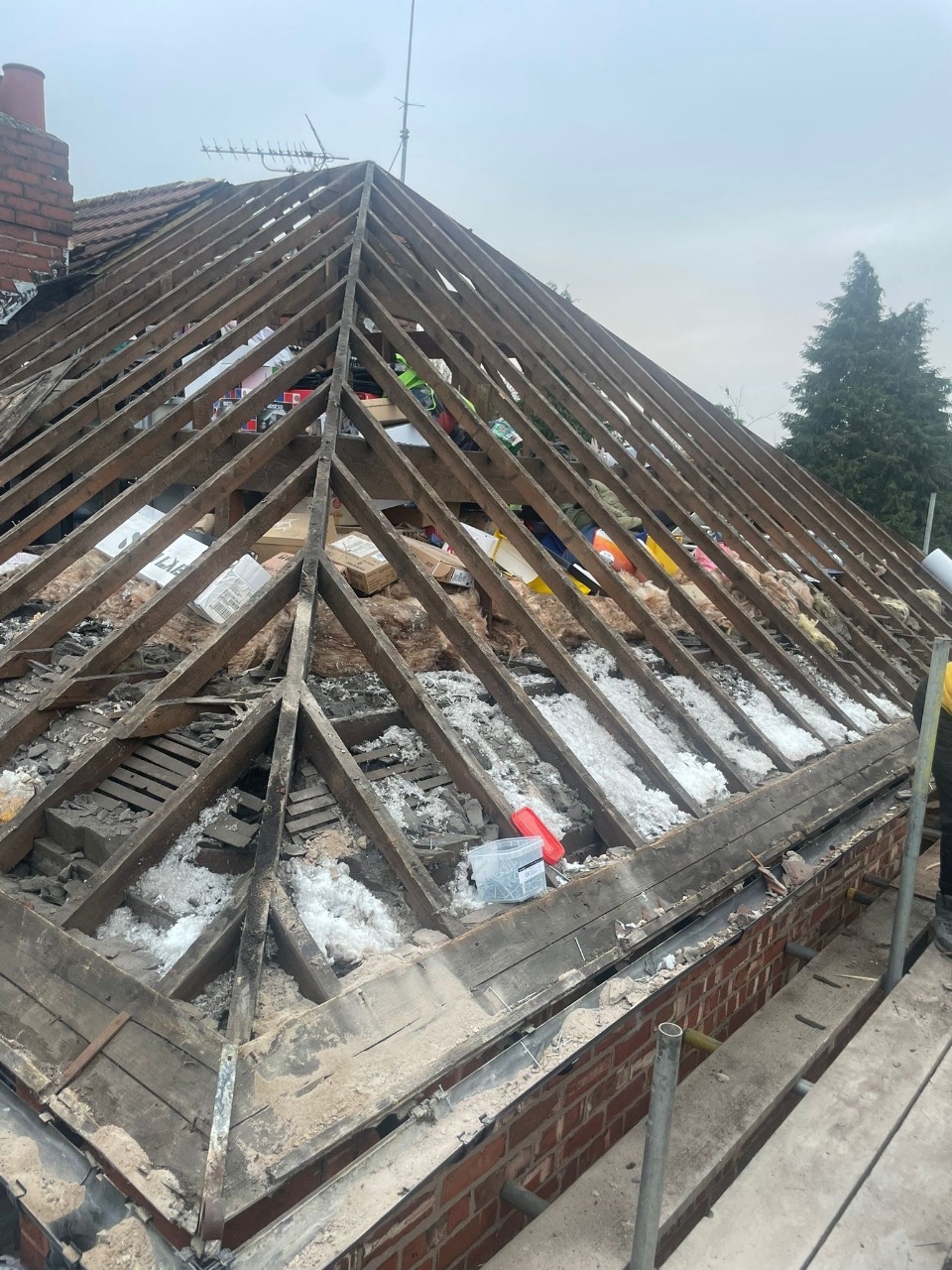 Professional roof repairs including leaks, broken tiles, and storm damage in Manchester
