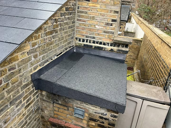 Professional installation and repair of flat roofing systems in Manchester