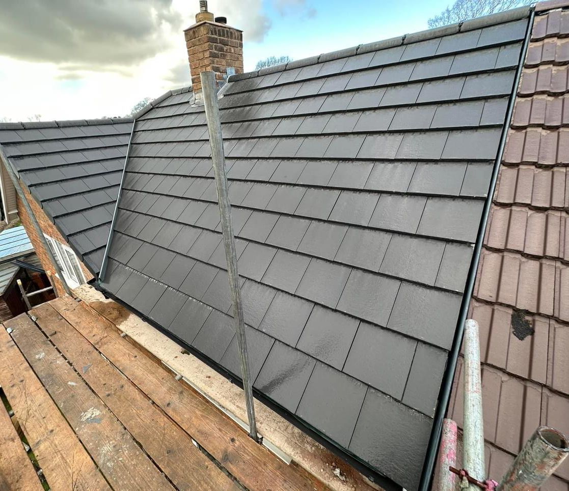 Expert installation of slate and tile roofs with traditional and modern materials in Manchester